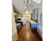Galley kitchen featuring updated cabinetry, tile flooring, and modern appliances at 3211 W Campbell Ave, Phoenix, AZ 85017