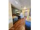 Traditional kitchen features tile floors, gray cabinets, and standard appliances at 3211 W Campbell Ave, Phoenix, AZ 85017