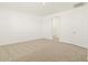 Bedroom with neutral carpet, recessed lighting, and closet access at 37131 W Parador Ln, Maricopa, AZ 85138