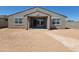 Large backyard featuring an outdoor covered patio and plenty of space for entertaining at 37194 W La Paz St, Maricopa, AZ 85138