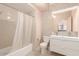 Modern bathroom with tiled walls, double sinks, and shower-tub combination at 4750 N Central Ave # N7, Phoenix, AZ 85012