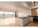 Bright living room with hardwood floors, large windows, and great views of the city and mountains at 4750 N Central Ave # N7, Phoenix, AZ 85012