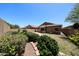 A well-maintained yard showcases lush landscaping and desert surroundings at 5130 W Molly Ln, Phoenix, AZ 85083