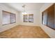 Dining area with tile flooring and several windows offering natural light at 5130 W Molly Ln, Phoenix, AZ 85083