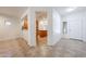 Inviting home foyer with tile floors leading to the kitchen and living areas at 5130 W Molly Ln, Phoenix, AZ 85083