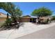 Charming single-Gathering home featuring a well-maintained yard, desert landscaping, and a spacious two-car garage at 5130 W Molly Ln, Phoenix, AZ 85083