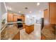 Spacious kitchen with stainless appliances, granite countertops, and a kitchen island at 5130 W Molly Ln, Phoenix, AZ 85083