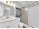 Updated bathroom featuring a modern vanity, tiled shower, and stylish fixtures for a fresh look at 5237 W Mountain View Rd, Glendale, AZ 85302