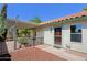 Cozy backyard with a covered patio, a well-kept garden, and a private entrance at 5902 E Juniper Ave, Scottsdale, AZ 85254