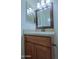 Bathroom vanity features granite countertop and wood cabinets at 5902 E Juniper Ave, Scottsdale, AZ 85254