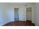 Bedroom with closet and wood-look flooring at 5902 E Juniper Ave, Scottsdale, AZ 85254