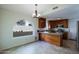 Stylish kitchen with stainless steel appliances, granite countertops, and a cozy breakfast nook at 5902 E Juniper Ave, Scottsdale, AZ 85254