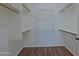 Spacious walk-in closet offers ample shelving and hanging space, perfect for organization at 5902 E Juniper Ave, Scottsdale, AZ 85254