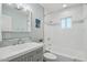 Updated bathroom showcasing a tiled shower and vanity at 615 E Winter Dr, Phoenix, AZ 85020