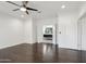 Spacious primary bedroom featuring dark hardwood floors and ensuite bathroom access at 615 E Winter Dr, Phoenix, AZ 85020