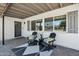 Cozy front porch with stylish seating and decor, offering a welcoming entrance to the home at 615 E Winter Dr, Phoenix, AZ 85020