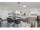 Open floor plan with a modern kitchen, dining area, and elegant decor at 615 E Winter Dr, Phoenix, AZ 85020