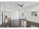Spacious living room with hardwood floors, French doors, and ample natural light at 615 E Winter Dr, Phoenix, AZ 85020