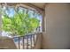 Balcony with a view of large green tree and blue sky at 7300 N Dreamy Draw Dr # 202, Phoenix, AZ 85020