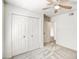 Bright bedroom with carpet, closet, ceiling fan offering ample storage and comfort at 7300 N Dreamy Draw Dr # 202, Phoenix, AZ 85020