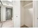A closet with shelving and a hanging rod, located off an ensuite bathroom at 7300 N Dreamy Draw Dr # 202, Phoenix, AZ 85020