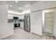 This kitchen offers stainless steel appliances and a hallway closet at 7300 N Dreamy Draw Dr # 202, Phoenix, AZ 85020