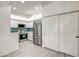 Modern kitchen with white cabinets, stainless steel appliances, and stylish backsplash at 7300 N Dreamy Draw Dr # 202, Phoenix, AZ 85020
