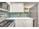 Kitchen featuring stainless appliances, sleek countertops, and modern cabinets at 7300 N Dreamy Draw Dr # 202, Phoenix, AZ 85020