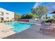 Relaxing community pool area featuring lounge chairs and clear water for residents' enjoyment at 7300 N Dreamy Draw Dr # 202, Phoenix, AZ 85020