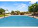 Recreational basketball court and playground in a community park setting at 817 E Lamonte St, San Tan Valley, AZ 85140