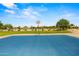 Community basketball court on a sunny day, inviting for sports and recreation at 817 E Lamonte St, San Tan Valley, AZ 85140
