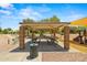 Covered picnic area with tables, perfect for outdoor gatherings and community events at 817 E Lamonte St, San Tan Valley, AZ 85140
