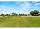 Community park with a volleyball court and lush grass, creating a perfect recreational space at 817 E Lamonte St, San Tan Valley, AZ 85140