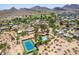 A community with golf course, homes, and desert landscape offering serene views and activities at 851 E Village Circle N Dr, Phoenix, AZ 85022