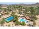 Desert homes showcasing a pool and tennis court, blending community amenities with natural beauty at 851 E Village Circle N Dr, Phoenix, AZ 85022