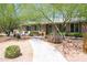 A charming home with a walkway and landscaped front yard at 851 E Village Circle N Dr, Phoenix, AZ 85022