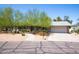 Charming single-story home featuring drought-resistant landscaping and a two car garage at 851 E Village Circle N Dr, Phoenix, AZ 85022