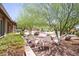 The front yard offers mature landscaping and seating at 851 E Village Circle N Dr, Phoenix, AZ 85022