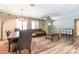 An open-concept living space featuring wood-look tile flooring and lots of natural light at 851 E Village Circle N Dr, Phoenix, AZ 85022