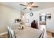 Open concept dining area with a view to the kitchen and living areas at 856 N Evergreen St, Chandler, AZ 85225