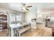 Bright dining room with a ceiling fan and a view into the kitchen at 856 N Evergreen St, Chandler, AZ 85225