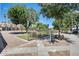 Downtown Chandler pedestrian area with decorative fence and trees at 856 N Evergreen St, Chandler, AZ 85225