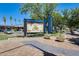 Downtown Chandler park sign, advertising Summer Market with ample parking nearby at 856 N Evergreen St, Chandler, AZ 85225