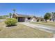Inviting home with solar panels, covered parking, and a tidy front yard at 856 N Evergreen St, Chandler, AZ 85225