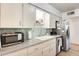 The kitchen features a stainless steel refrigerator and dishwasher, as well as modern appliances at 856 N Evergreen St, Chandler, AZ 85225