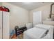 This laundry room is equipped with white appliances, storage, and organization at 856 N Evergreen St, Chandler, AZ 85225