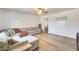 Spacious living area featuring modern flooring and a comfortable sofa, perfect for relaxation at 856 N Evergreen St, Chandler, AZ 85225