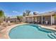 Relaxing backyard featuring a refreshing pool, covered patio, and ample seating area at 856 N Evergreen St, Chandler, AZ 85225