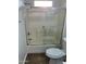 Bathroom features a shower and tub combination with tiled walls and glass doors at 9070 E Gary Rd # 152, Scottsdale, AZ 85260