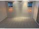 Bedroom with carpeted flooring, two small windows, and neutral wall color at 9070 E Gary Rd # 152, Scottsdale, AZ 85260